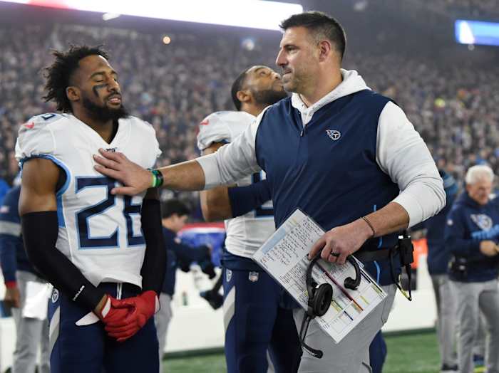 Tennessee Titans head coach Mike Vrabel pats cornerback Logan Ryan (26) on the chest before the AFC Wild Card game at Gillette Stadium against the New England Patriots Saturday, Jan. 4, 2020 in Foxborough, Mass.